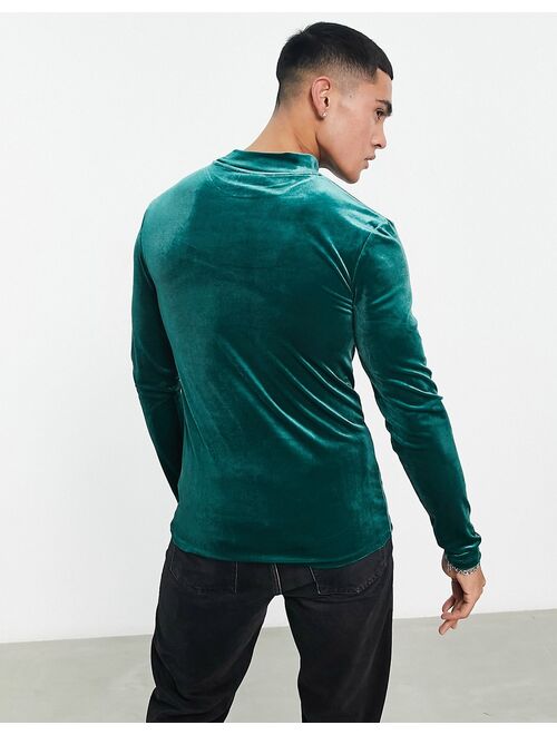 ASOS DESIGN muscle fit long sleeve T-shirt in dark green velour with turtle neck