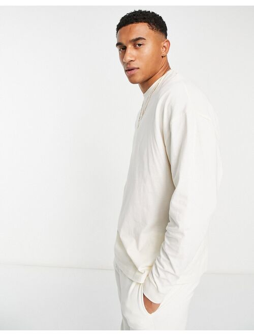 ASOS DESIGN long sleeve oversized t-shirt in cream