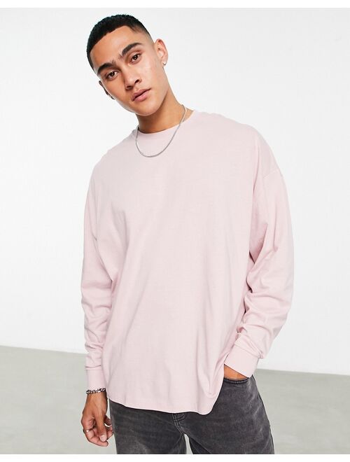 ASOS DESIGN long sleeve oversized t-shirt in washed pink