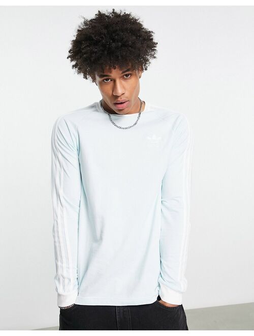 adidas Originals adicolor 3-Stripes long sleeve top in almost blue