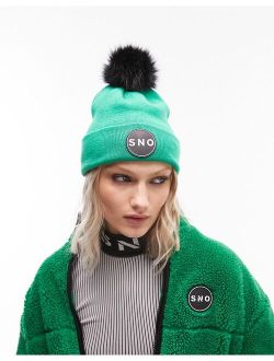 Ski faux fur pom beanie in green