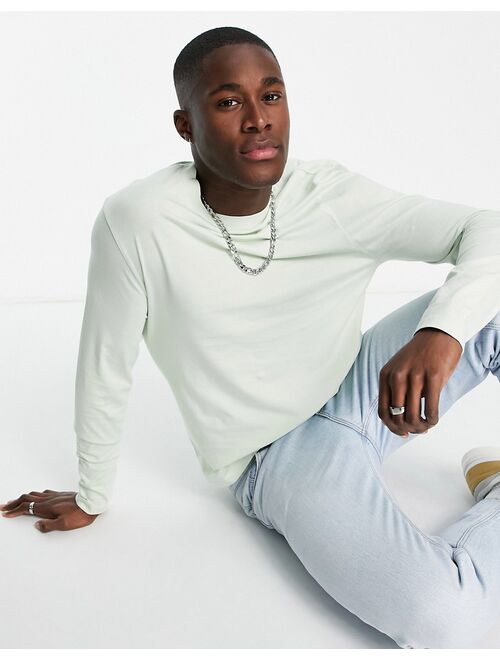 ASOS DESIGN long sleeve T-shirt with crew neck in washed green