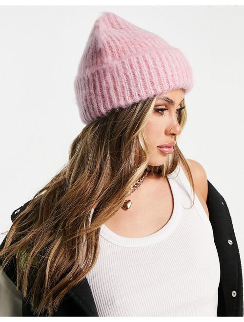 ASOS DESIGN two tone fluffy beanie in pink