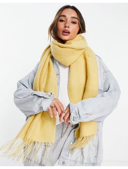 ASOS DESIGN supersoft scarf with tassels in yellow