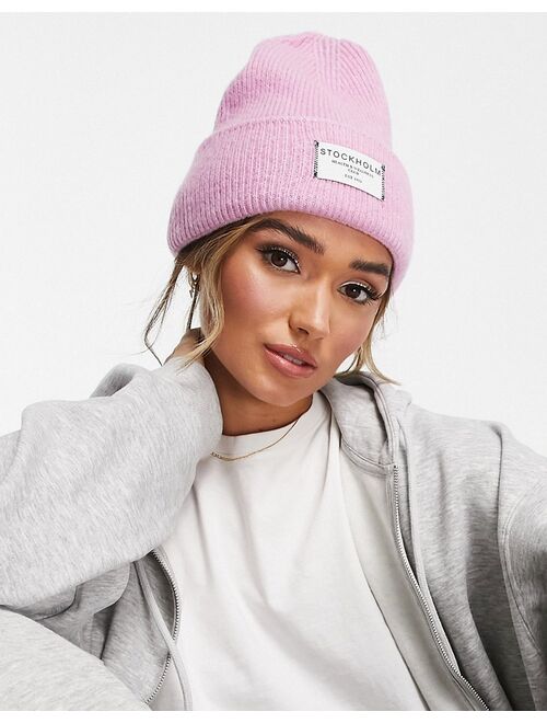 ASOS DESIGN label beanie in pink