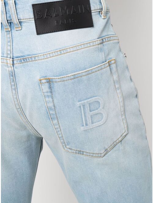 Balmain embossed-logo slim-cut jeans