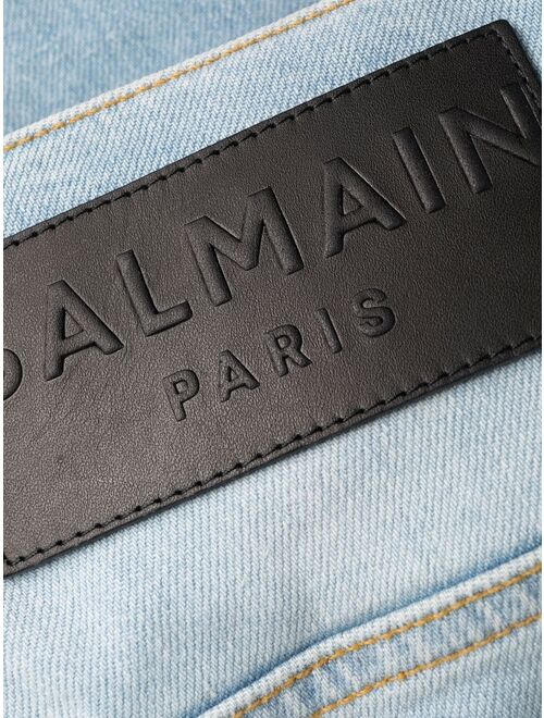 Balmain embossed-logo slim-cut jeans