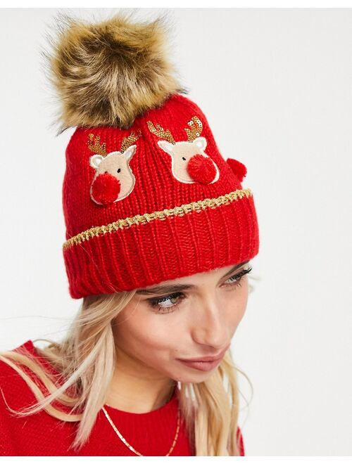 Boardmans christmas faux fur pom with reindeers beanie in red