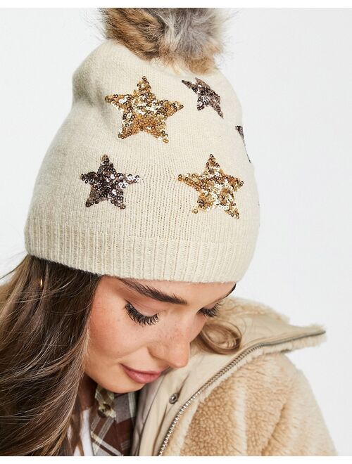 Boardmans christmas faux fur pom with sequin stars beanie in cream