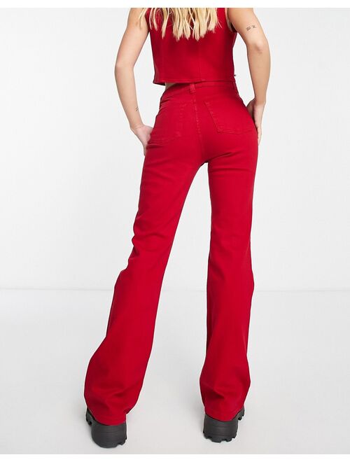 ASOS DESIGN flared jeans in red - part of a set