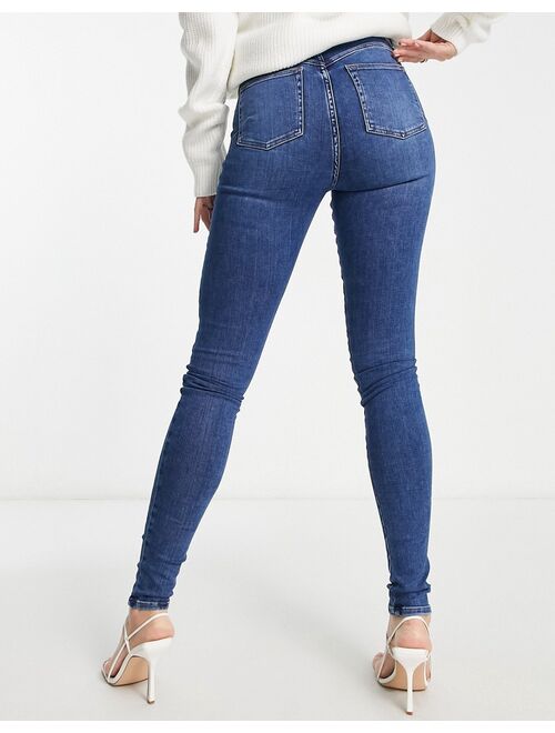 ASOS DESIGN Tall sculpting skinny jeans in dark blue