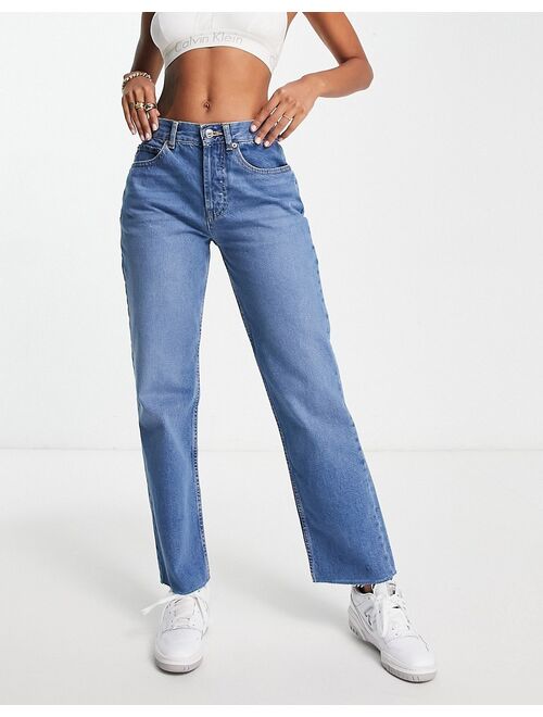 ASOS DESIGN 90s straight jean with raw hem in mid blue