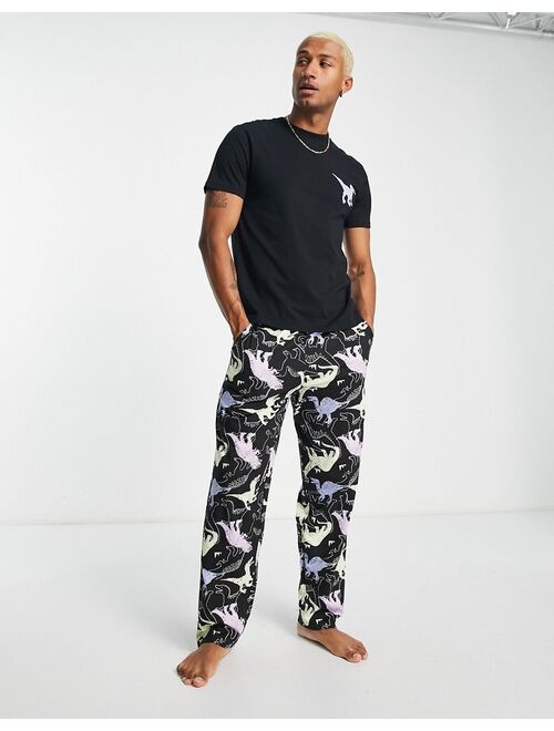 ASOS DESIGN lounge t-shirt and pants pajama set in dinosaur print