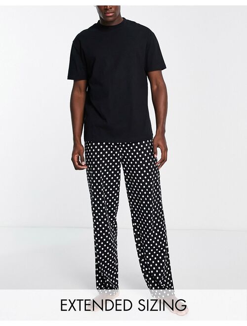 ASOS DESIGN pajama set with T-shirt and pants in black and white spot