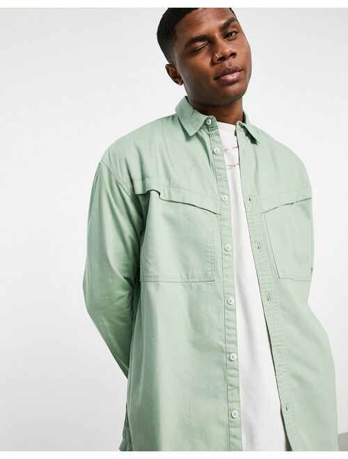 Topman overshirt with angled pocket in sage green