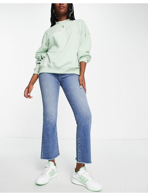 Miss Selfridge cropped kickflare jean in mid wash