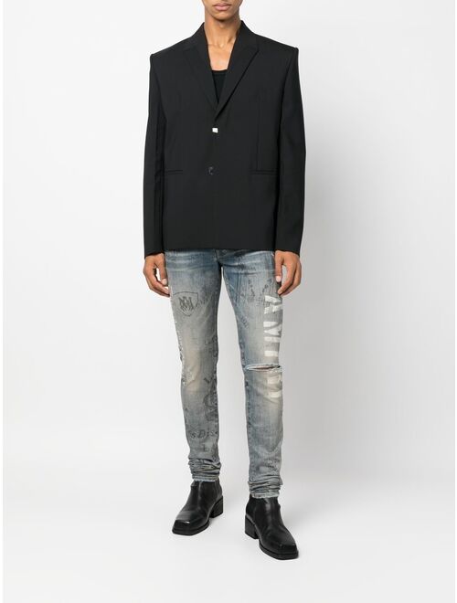 AMIRI slim-fit illustration print jeans