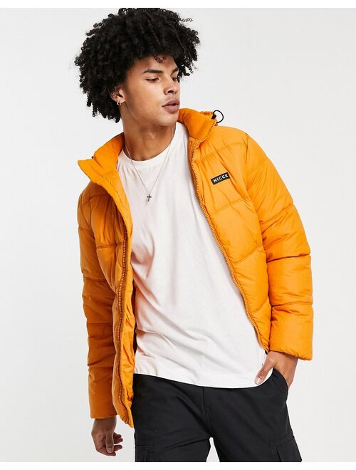 Nicce expo padded jacket in orange