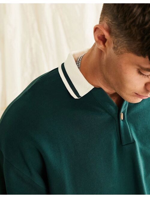 ASOS DESIGN oversized rugby polo sweatshirt with tipping in green