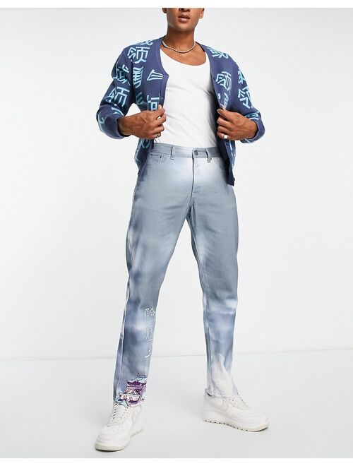 Liquor N Poker straight leg denim jeans in blue with placement landscape print