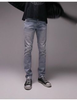 raw hem stretch skinny jeans in bleach