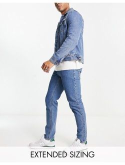 slim jeans in flat mid wash blue