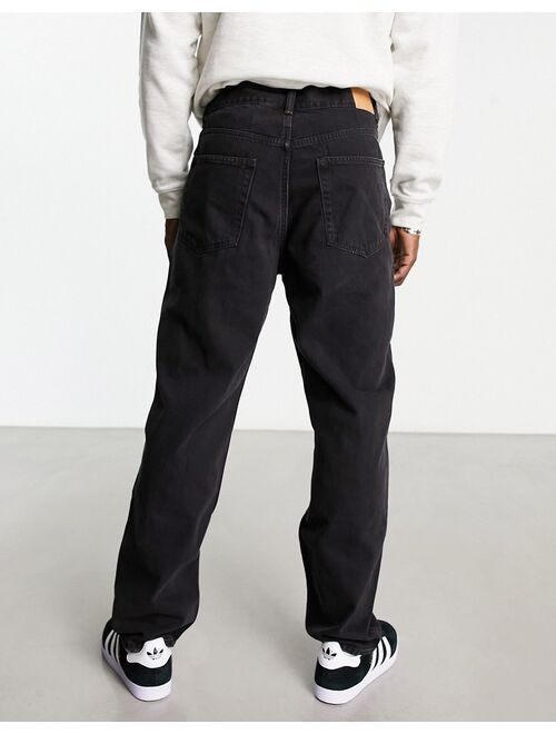 Weekday tape loose tapered jeans in black lux