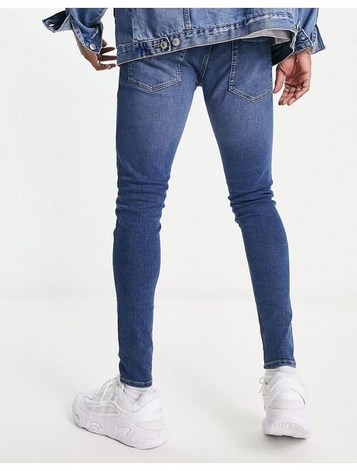 ADPT spray on skinny jean in mid blue wash