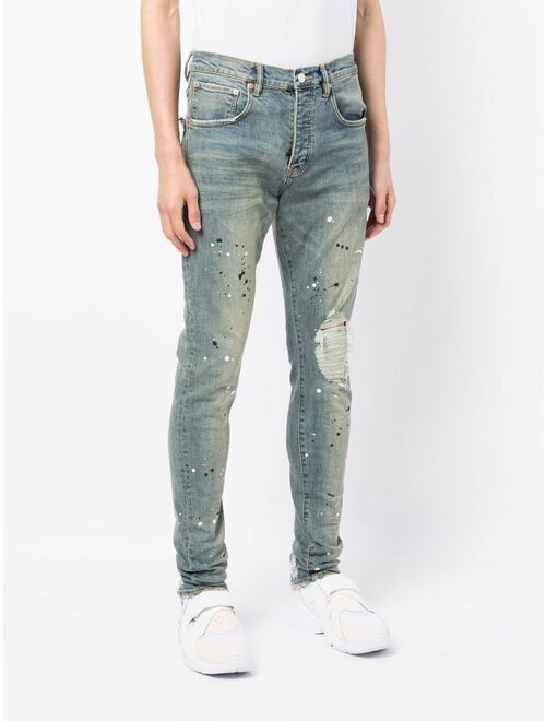 Purple Brand paint-splattered distressed jeans