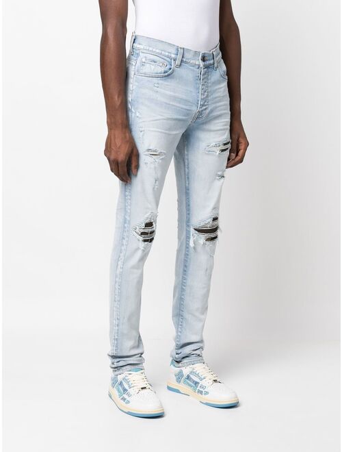 AMIRI distressed slim-fit jeans