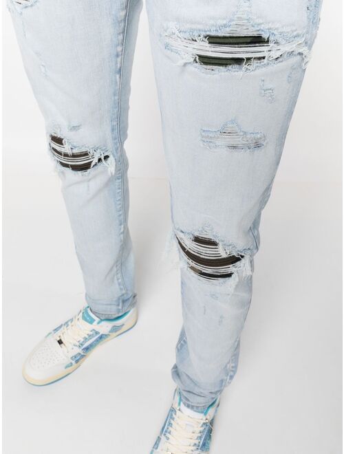 AMIRI distressed slim-fit jeans