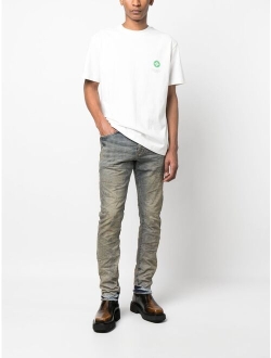 distressed slim-fit jeans