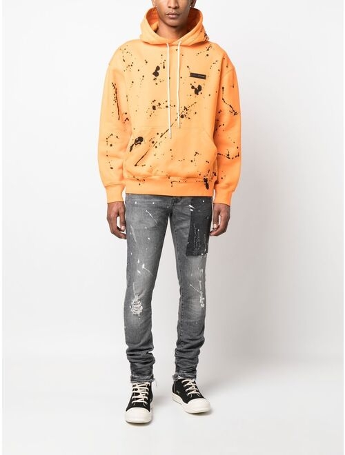 Purple Brand paint-splatter slim-fit jeans