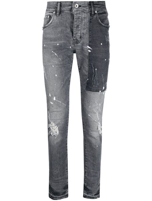 Purple Brand paint-splatter slim-fit jeans