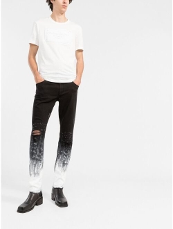 brushstroke-print slim-fit jeans