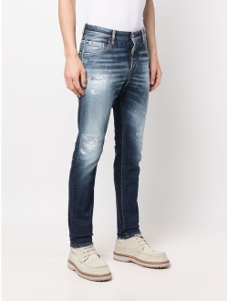 distressed-effect slim jeans
