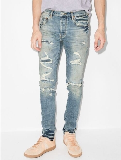 P001 Vintage distressed-finish skinny jeans
