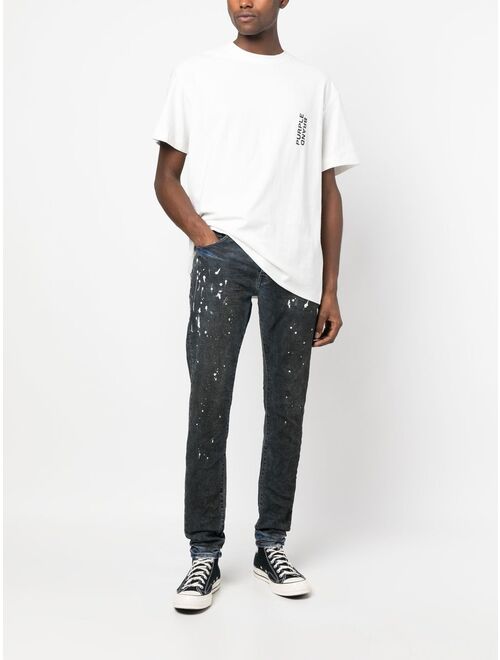 Purple Brand paint-splatter detail jeans