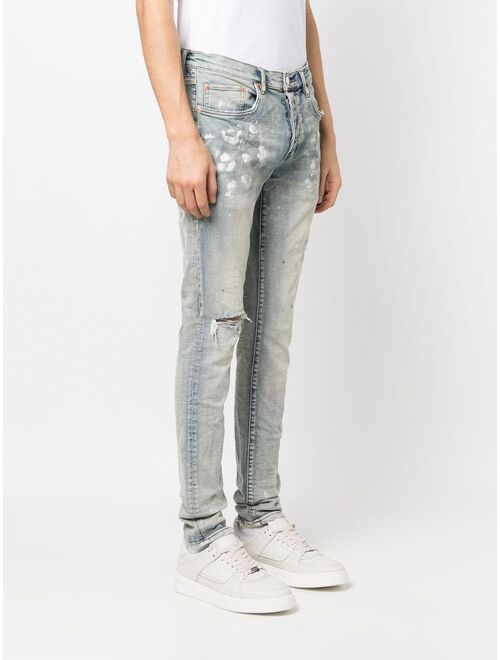 Purple Brand paint splatter-print distressed jeans