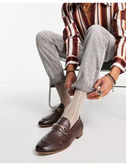 loafers in brown faux leather with oversize tassel detail