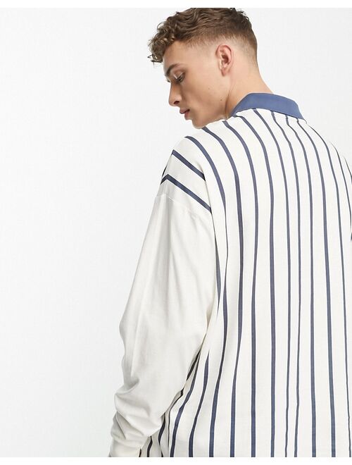 ASOS DESIGN oversized long sleeve polo shirt with front city print