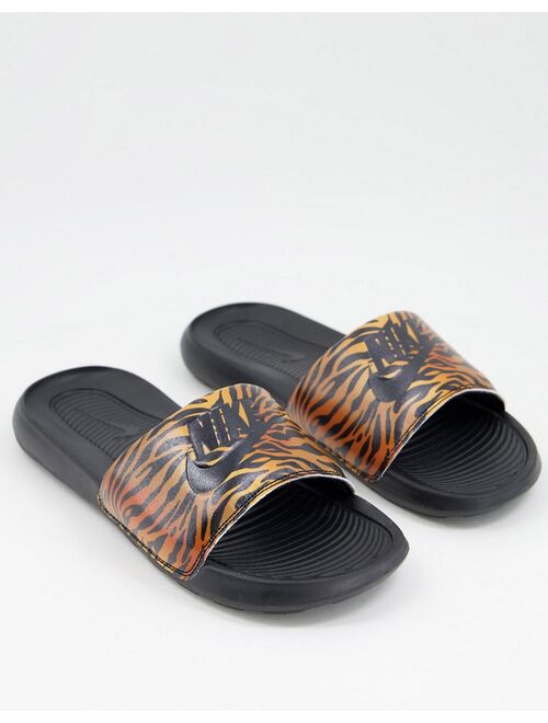 Nike Victori One animal print sliders in black/multi