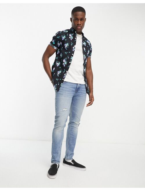 ASOS DESIGN stretch skinny shirt in black and blue floral print