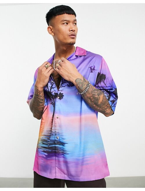 ASOS DESIGN relaxed revere satin shirt in scenic print