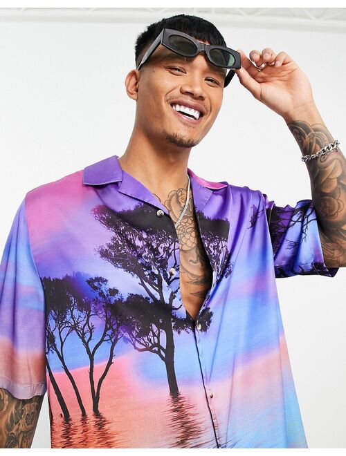 ASOS DESIGN relaxed revere satin shirt in scenic print