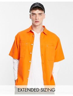 boxy oversized denim shirt in bright orange