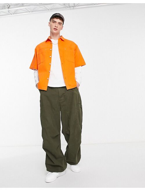 ASOS DESIGN boxy oversized denim shirt in bright orange