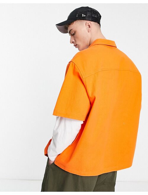 ASOS DESIGN boxy oversized denim shirt in bright orange