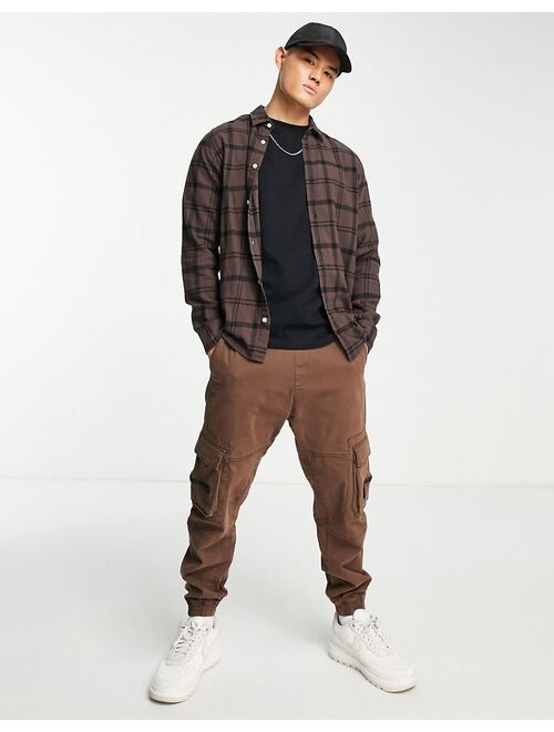 ADPT oversized flannel check shirt in brown