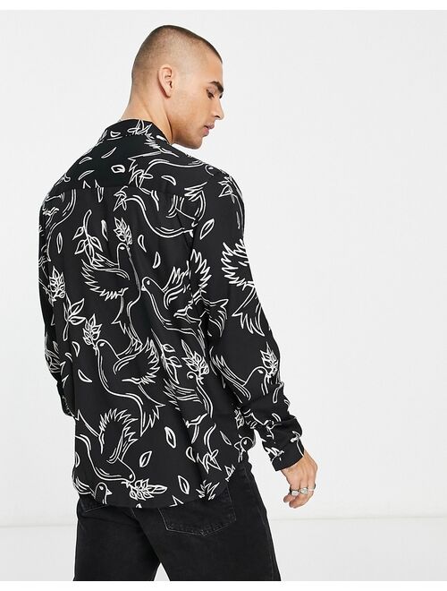 ASOS DESIGN relaxed camp collar shirt in black with bird print